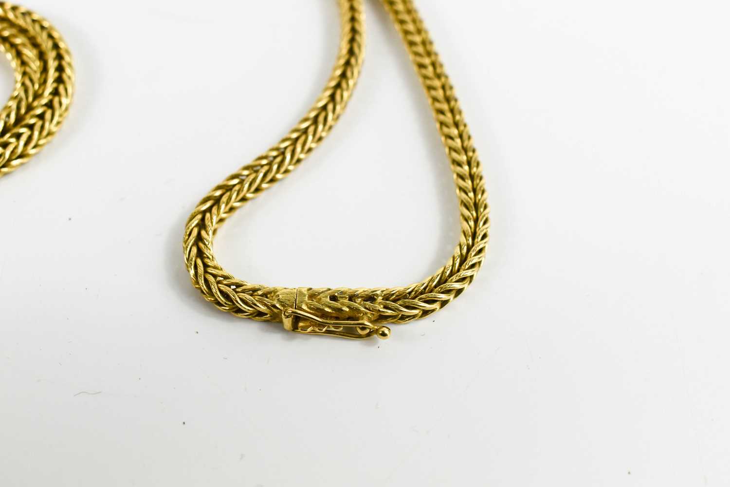 An 18ct gold ropetwist necklace, with slide clasp and safety clip, 79g. - Image 2 of 2