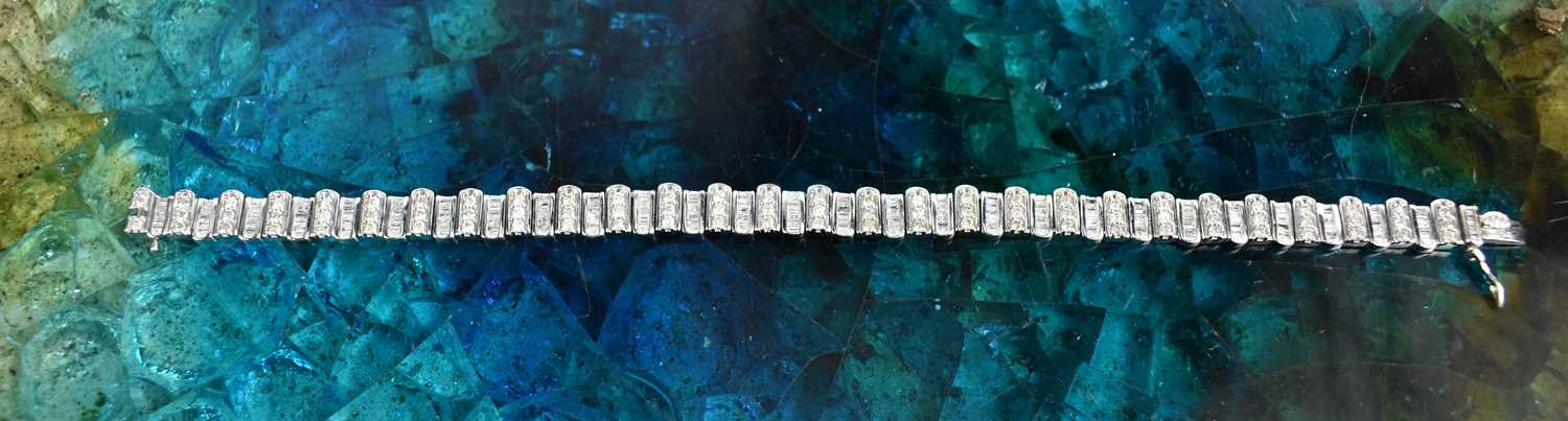 A 9ct white gold and diamond tennis bracelet, composed of links set with baguette cut and - Image 4 of 6