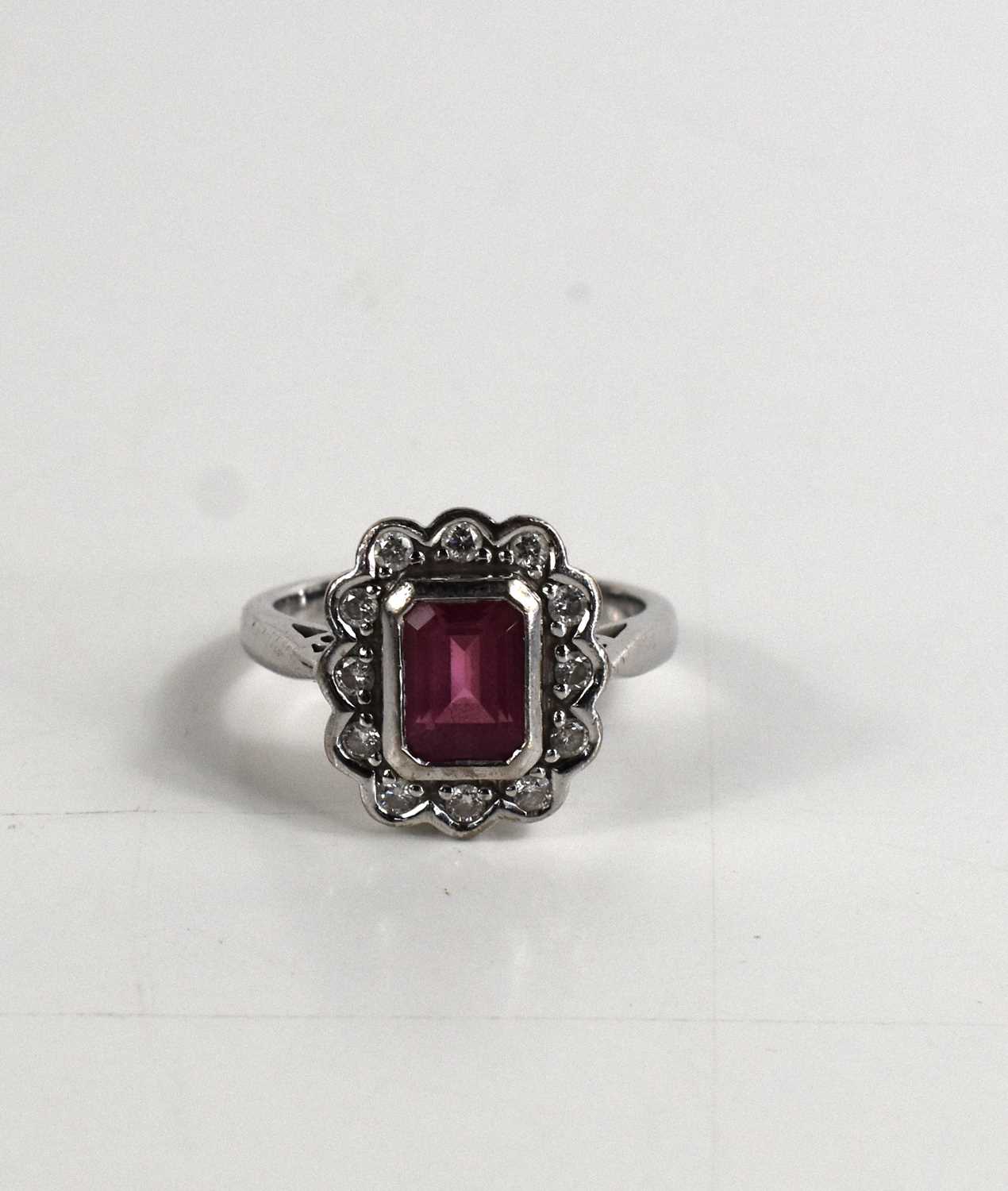 An 18ct with gold, pink tourmaline and diamond dress ring, the central emerald cut tourmaline of - Image 5 of 5