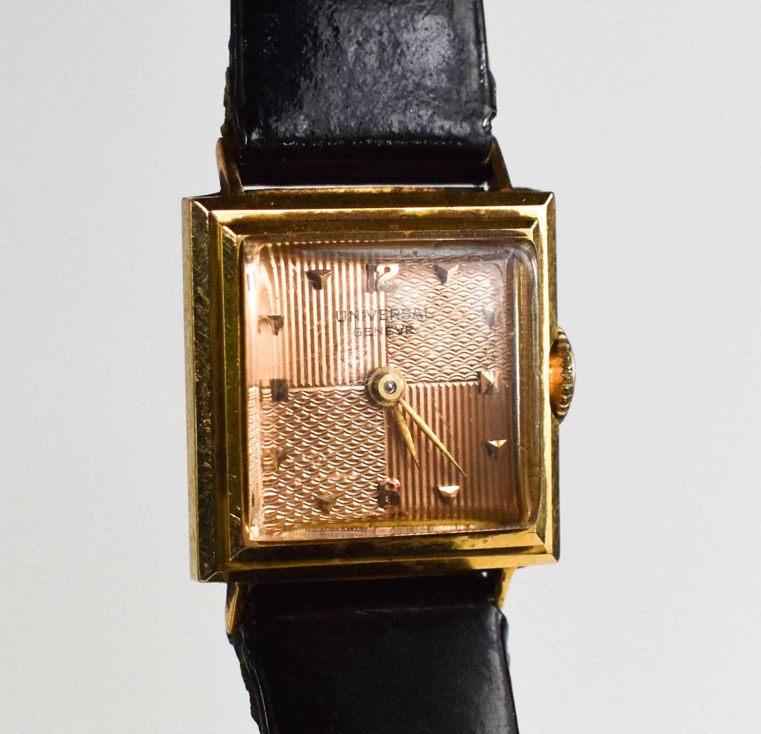 An 18ct Universal gold cased lady's watch, with engine turned rose gold coloured dial, with black - Image 3 of 4