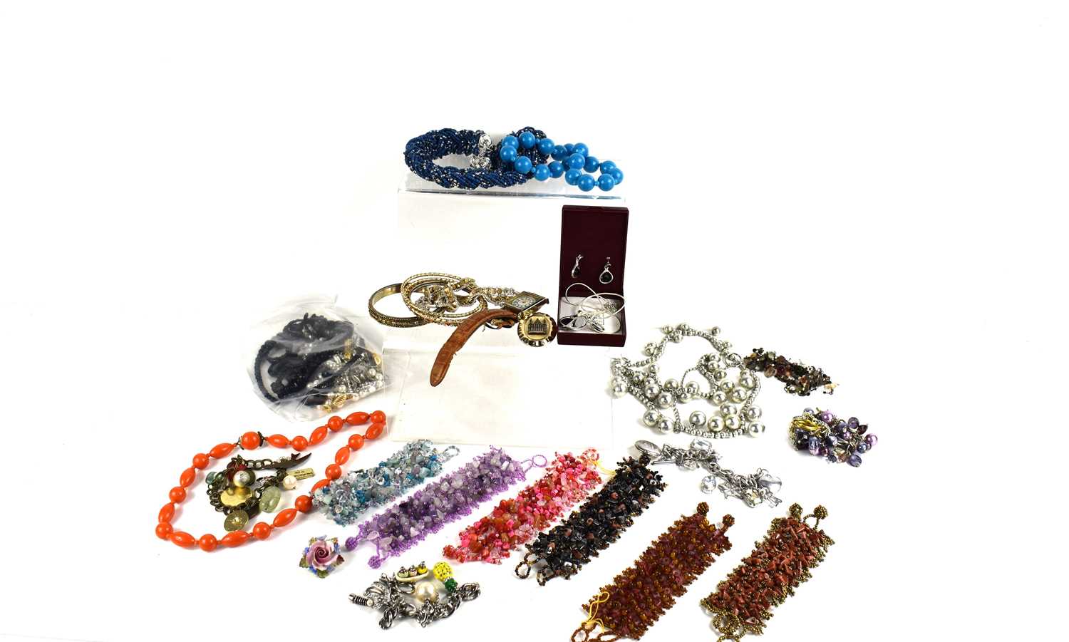 A quantity of vintage paste and costume jewellery, including a jet necklace with teardrop pendant,