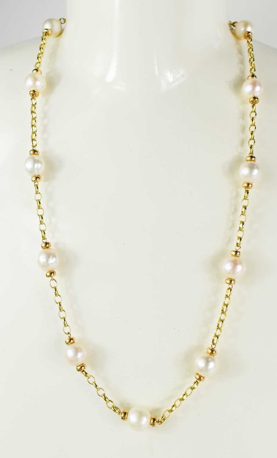 A 9ct gold and pearl necklace, each pearl united by chain form links, 33g.