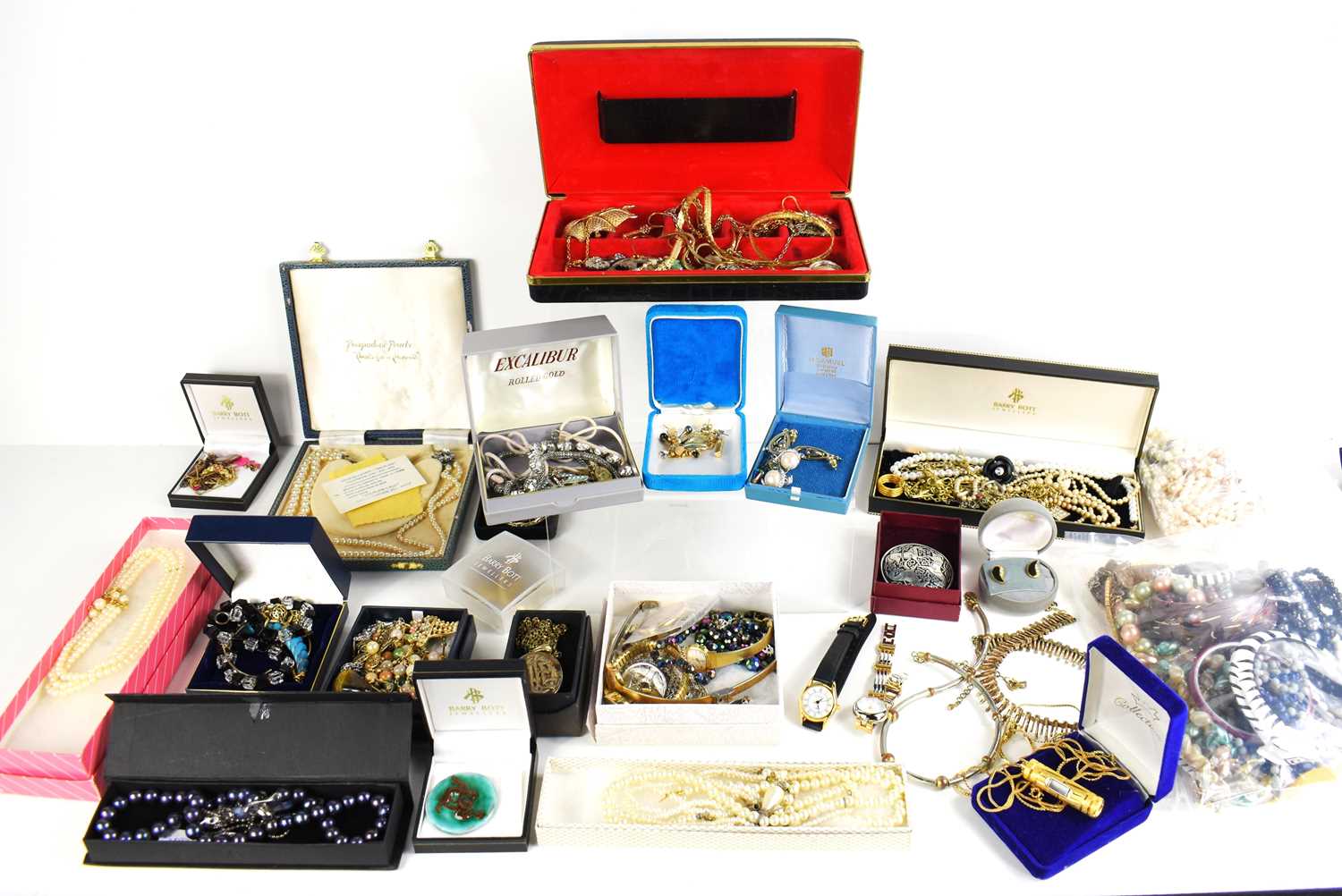 A large quantity of vintage and later costume jewellery, including beads, brooches, bangles,