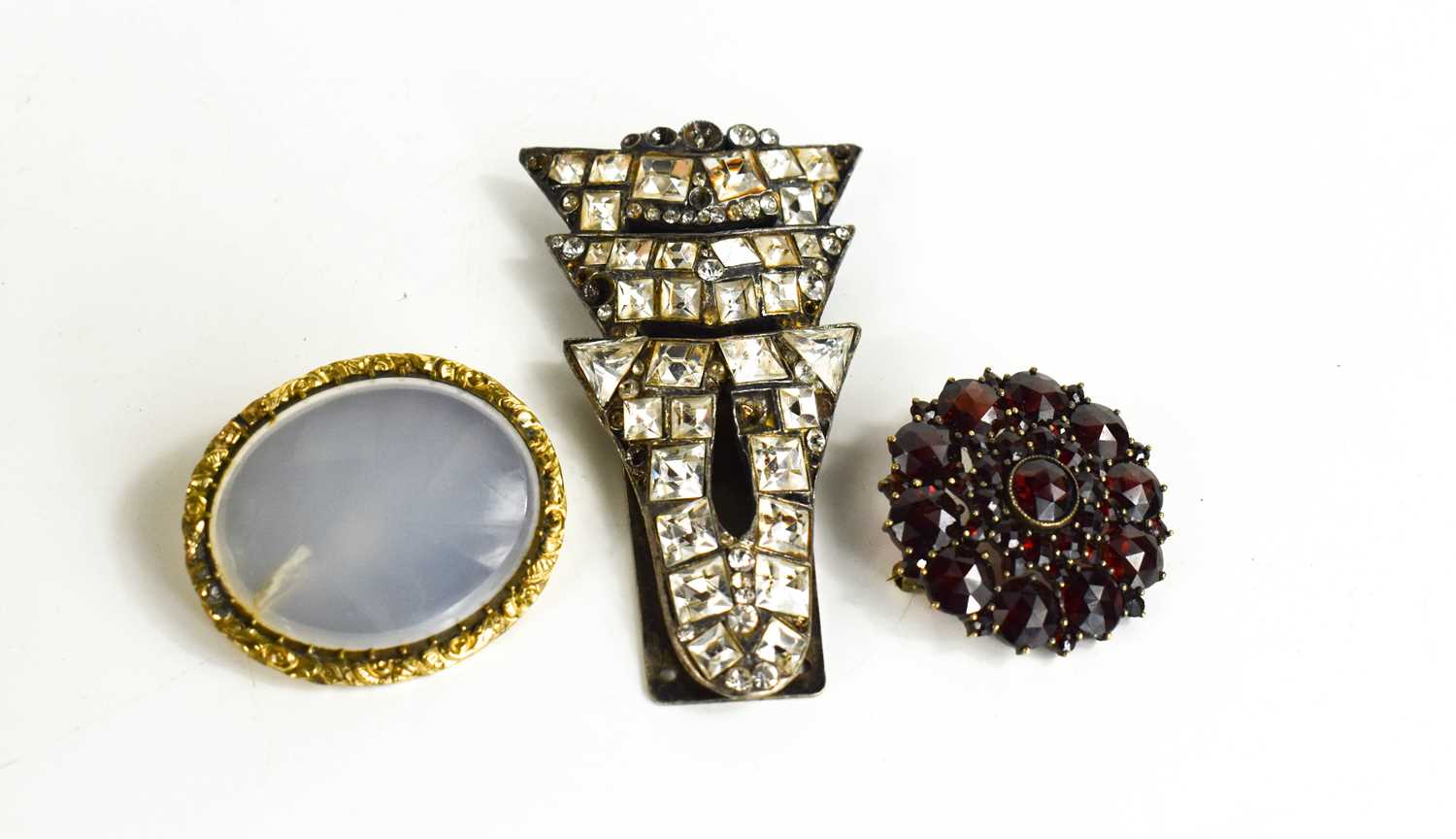 An Art Deco French dress clip set with paste stones, stamped Scemama, together with two Victorian - Image 3 of 4