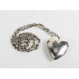 A Victorian silver heart form vesta case on chain, the case engraved with initials G J and