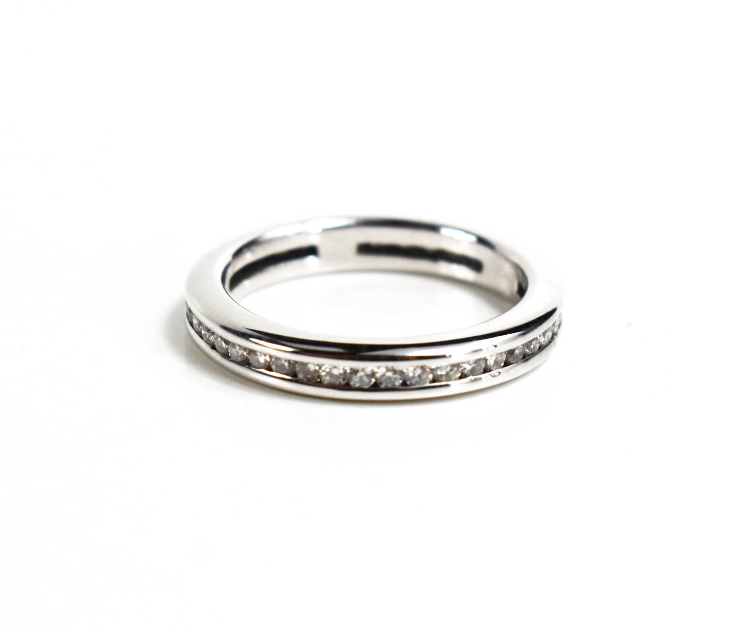 An 18ct white gold and diamond full eternity ring, size M, 4.2g.