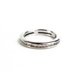 An 18ct white gold and diamond full eternity ring, size M, 4.2g.