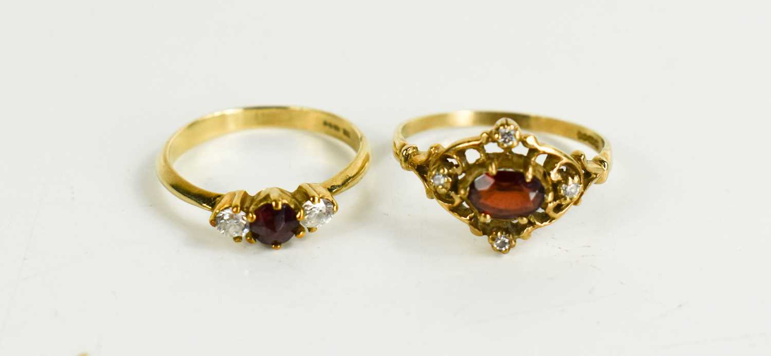 A 9ct gold three stone dress ring, size L, 1.6g together with a 9ct gold diamond and garnet dress