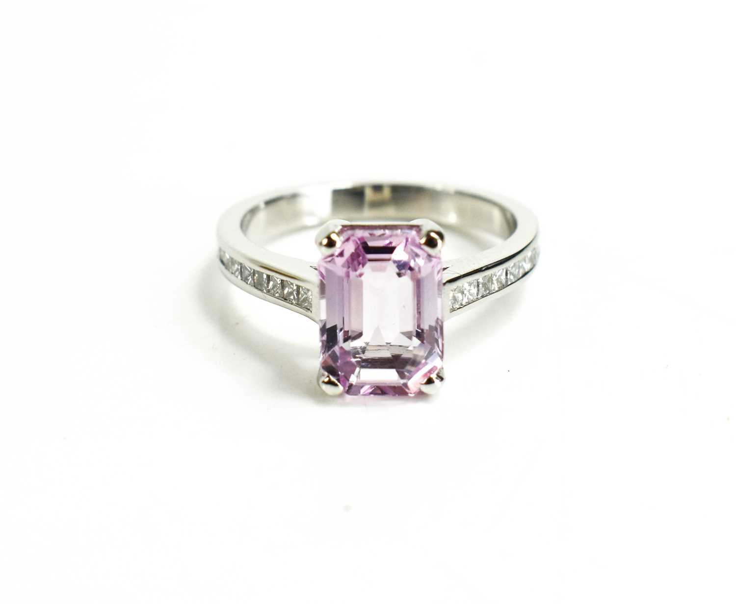 A platinum, pink topaz and diamond ring, the topaz totalling 3.17ct and the diamonds 0.30ct in