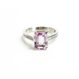 A platinum, pink topaz and diamond ring, the topaz totalling 3.17ct and the diamonds 0.30ct in