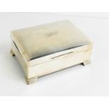 A silver cigarette box with engine turned decoration to the lid, monogram engraved, 11.4 by 8.7 by