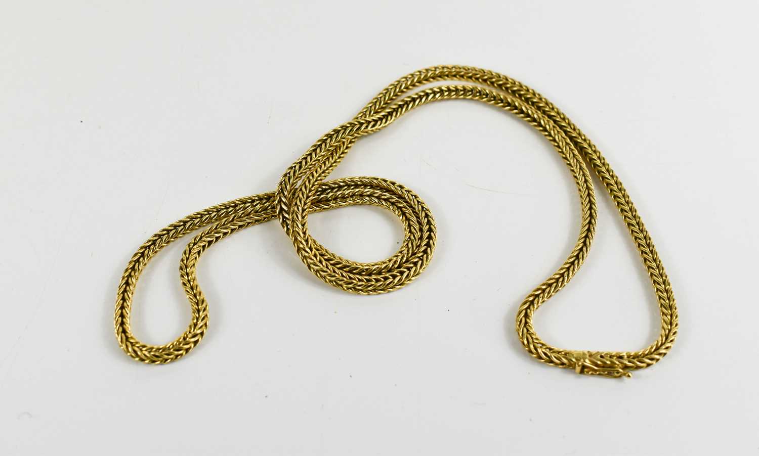 An 18ct gold ropetwist necklace, with slide clasp and safety clip, 79g.