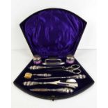 An Edwardian silver cased vanity set, Birmingham 1911, in velvet lined original presentation case.