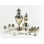 A silver sugar castor, together with a Dutch silver castor engraved with decoration, and having a