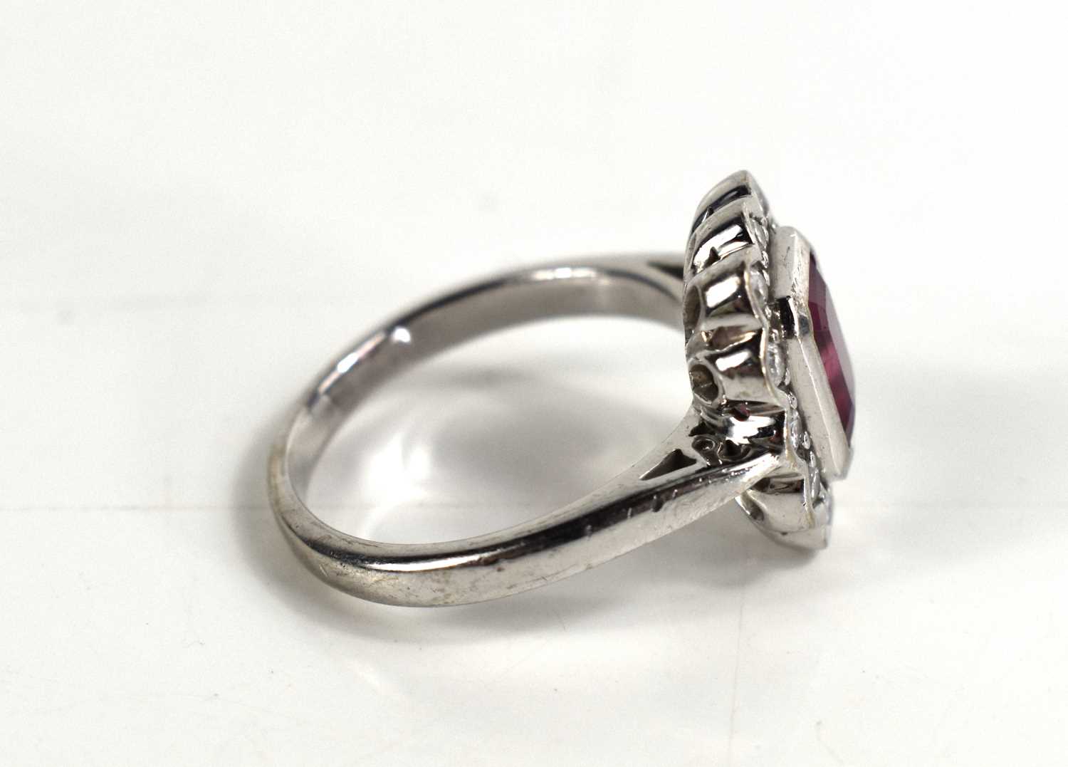 An 18ct with gold, pink tourmaline and diamond dress ring, the central emerald cut tourmaline of - Image 3 of 5