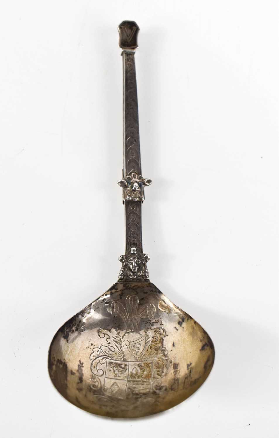 A Dutch silver metamorphic folding spoon and fork, circa 1800, the prongs of the fork fit into