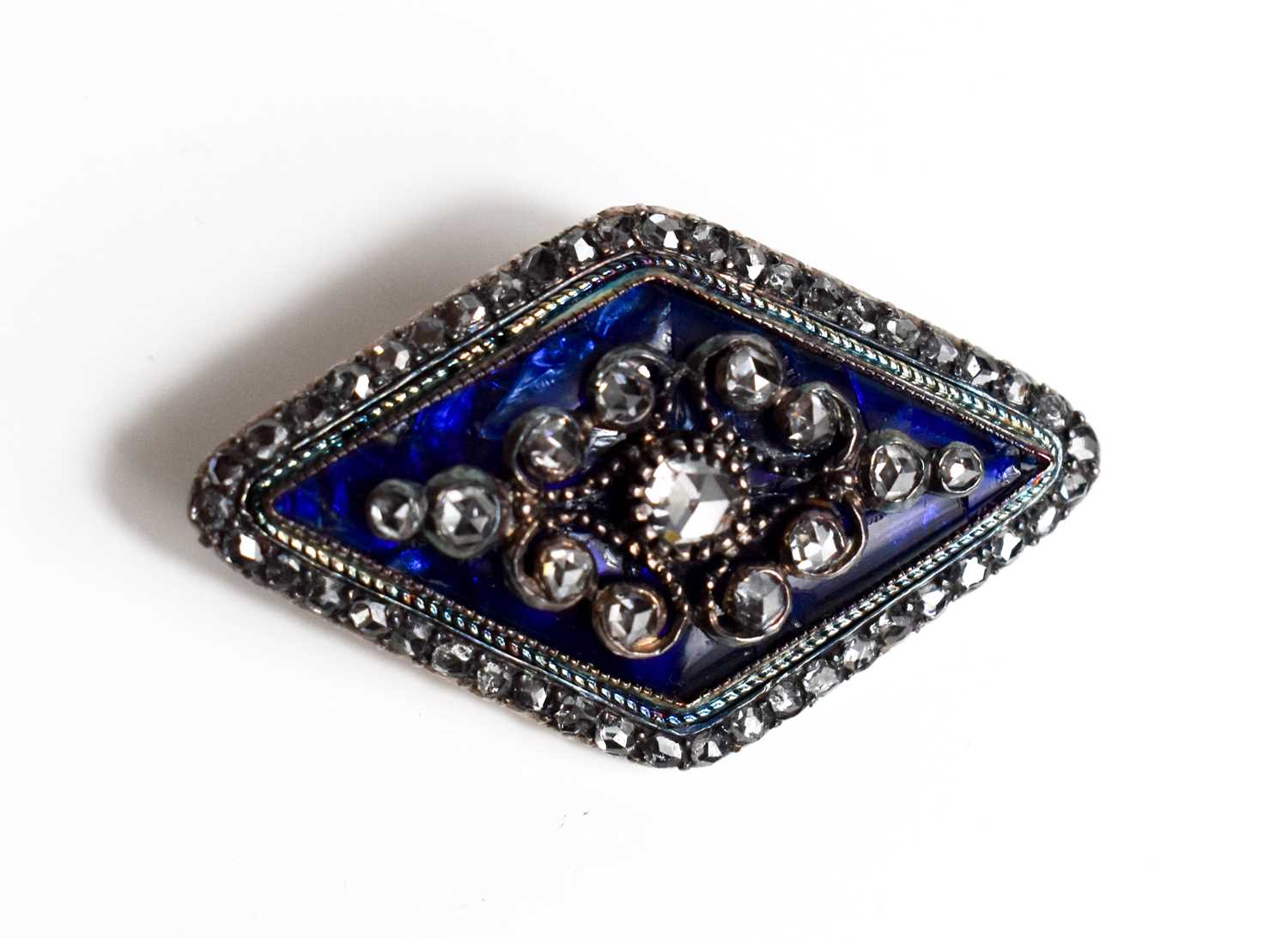 A 19th century diamond and enamel brooch, of diamond form, the old cut diamonds set in scrollwork on - Image 2 of 5