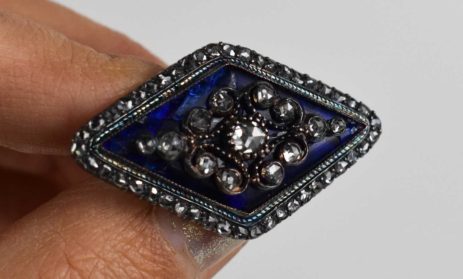 A 19th century diamond and enamel brooch, of diamond form, the old cut diamonds set in scrollwork on - Image 3 of 5