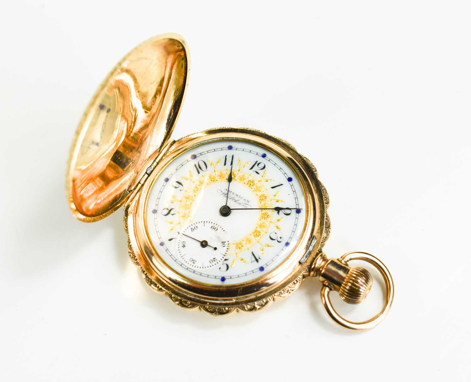 An American Waltham Watch Company keyless wind, gold plated pocket watch, the white enamel signed