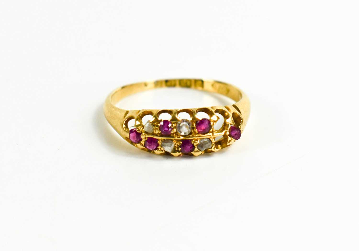 An 18ct gold, pink sapphire and diamond ring, size N, 2.4g, A/F