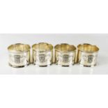 A set of four silver napkin rings, engraved souvenir of Paris plage, 2.7toz.