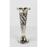 An Edwardian silver trumpet form vase with pierced sides, hallmarked for Chester, 18cm tall, 5.