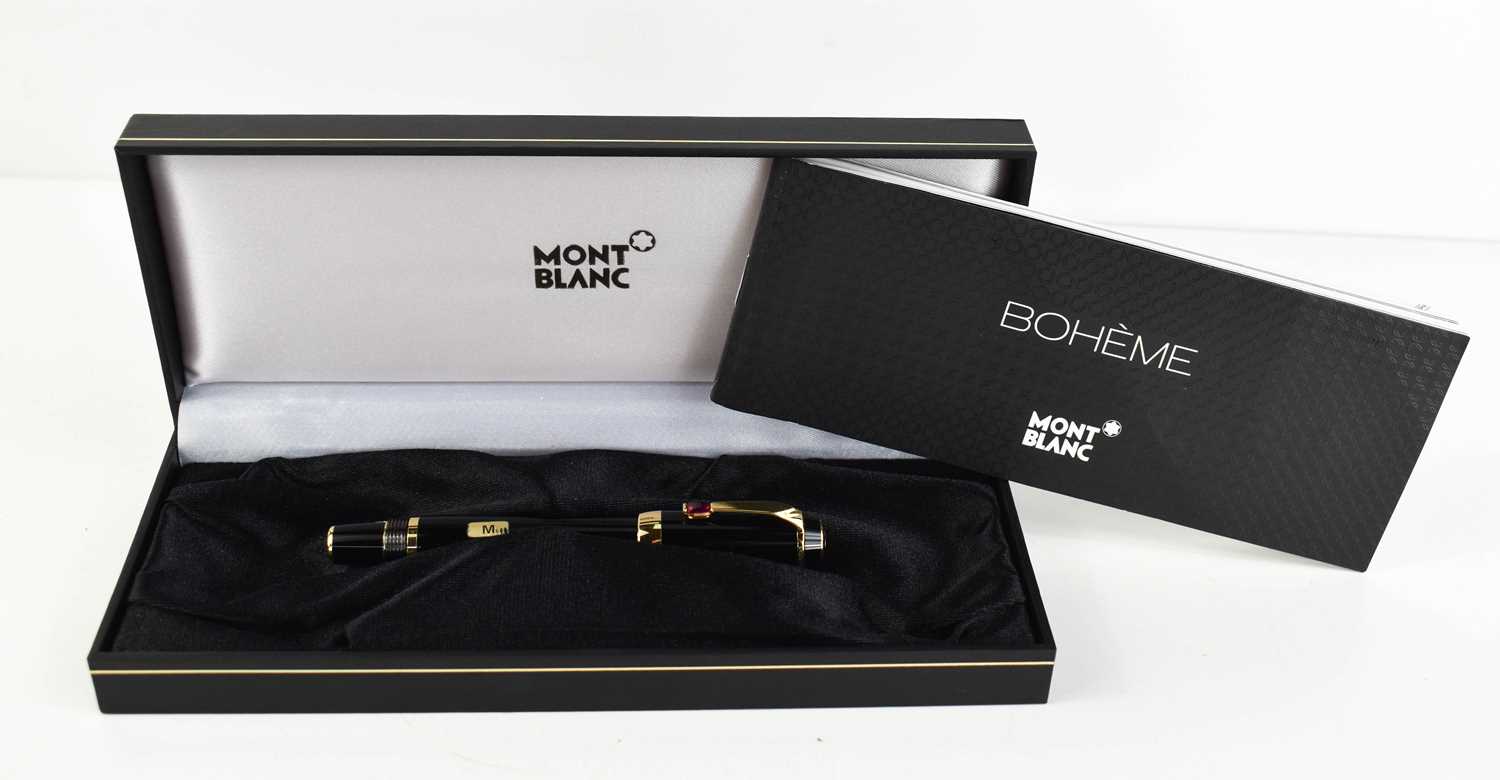 A Montblanc Boheme fountain pen, with twist retractable nib, and red stone to the clip, complete