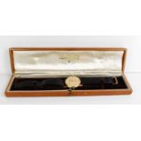 A gentleman's vintage gold cased Longines Flagship wristwatch, the signed champagne face with