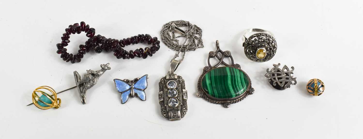 A group of jewellery to include a silver monogram collar stud, a malachite and silver pendant, a