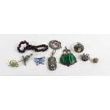 A group of jewellery to include a silver monogram collar stud, a malachite and silver pendant, a