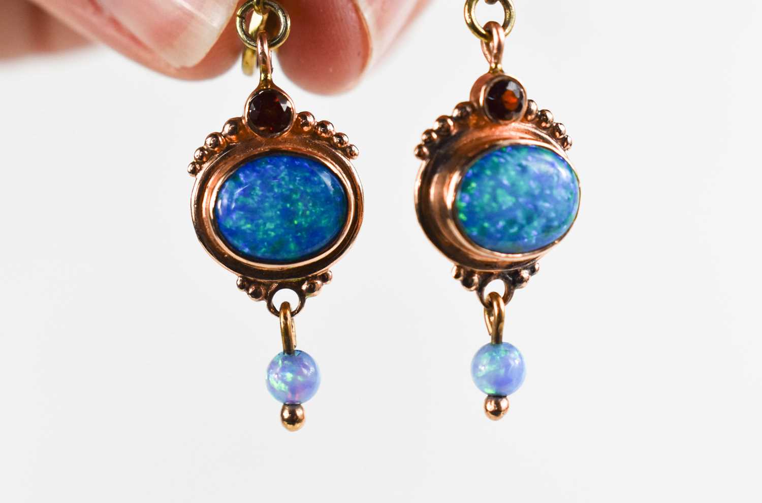 A 14ct gold, black opal and garnet ring, size O, 7.3g, and a pair of matching drops, set on base - Image 6 of 8