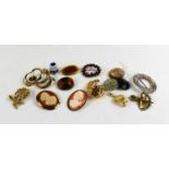 A group of vintage brooches to include a silver Norwegian Viking design brooch, hallmarked with RA