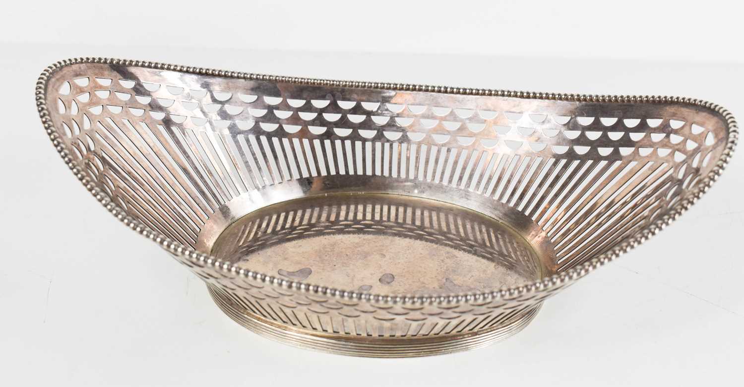 A Dutch silver basket dish of oval form, with pierced sides, beaded edge and reeded rim, 6.5toz. - Image 3 of 3