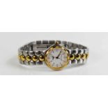 A lady's Longines wristwatch, the signed white dial with batons, minute track and date aperture,