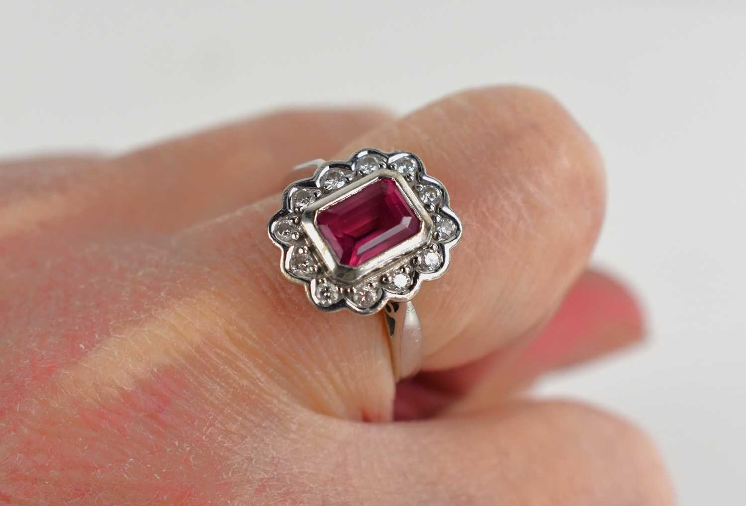 An 18ct with gold, pink tourmaline and diamond dress ring, the central emerald cut tourmaline of - Image 4 of 5