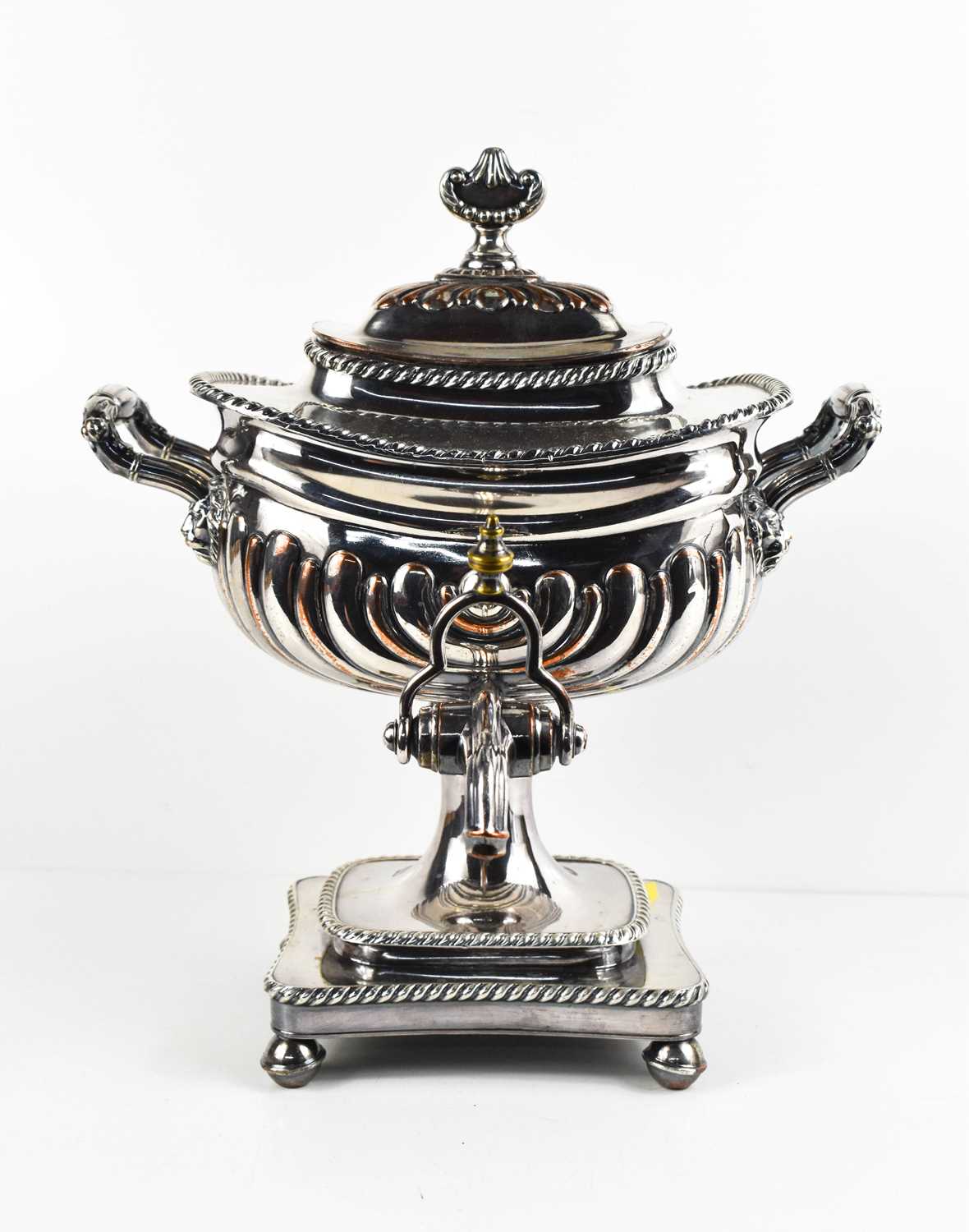 A Victorian silver plated samovar, with twin handles, gadrooned body, and raised on ball form