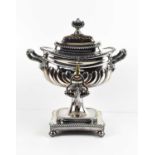 A Victorian silver plated samovar, with twin handles, gadrooned body, and raised on ball form