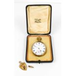 A 9ct gold open faced Waltham keyless wind pocket watch, with Roman numerals to the signed white