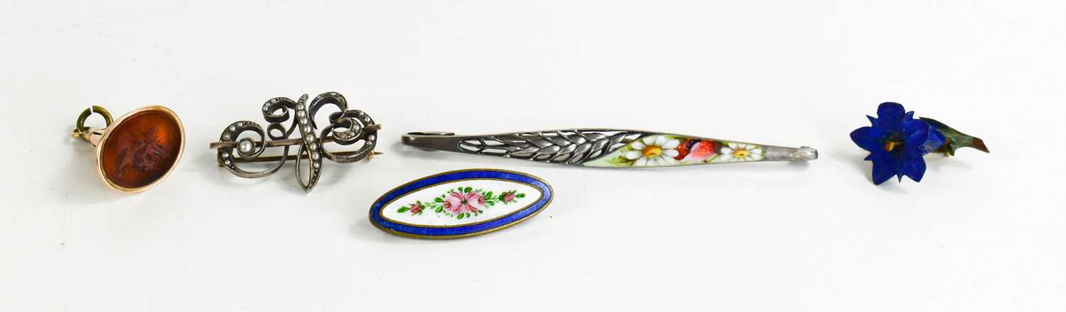 A silver and enamel 1920s bar brooch, the pierced decoration in the form of wheat, the enamelled