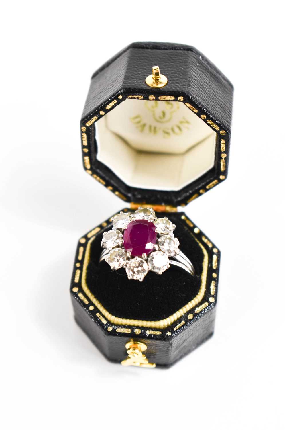 An 18ct white gold, (unmarked but tested as 18ct) ruby and diamond flowerhead ring, the central oval - Image 11 of 11