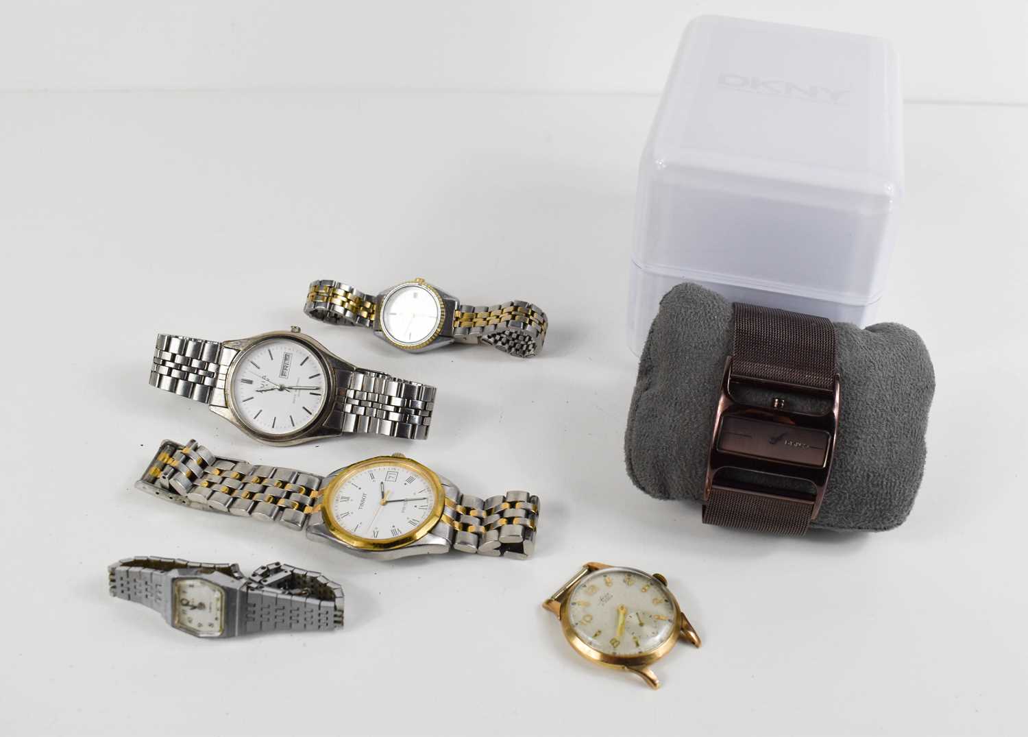 A 9ct gold (testing as) watch face, lacking strap, together with a selection of watches to include a