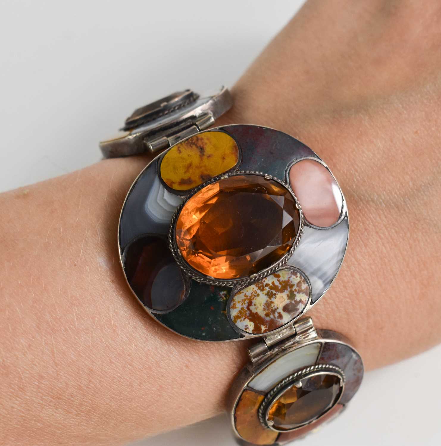 A Scottish silver, agate and orange Cairngorm stone set bracelet, composed of seven oval links, each - Image 2 of 3