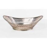 A Dutch silver basket dish of oval form, with pierced sides, beaded edge and reeded rim, 6.5toz.