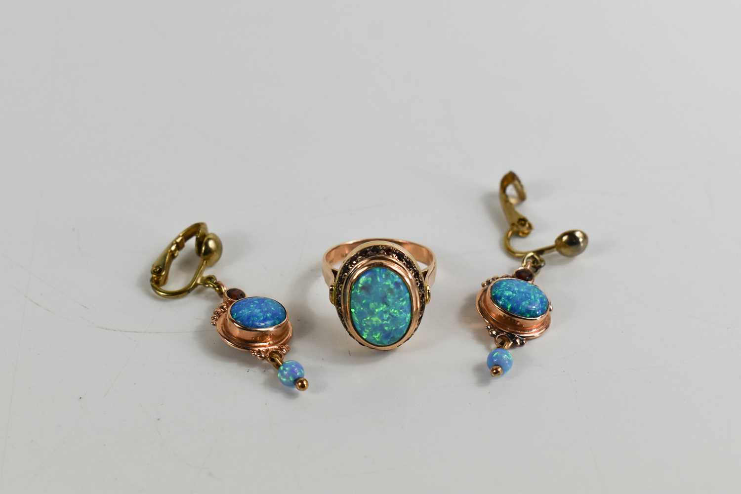 A 14ct gold, black opal and garnet ring, size O, 7.3g, and a pair of matching drops, set on base - Image 8 of 8