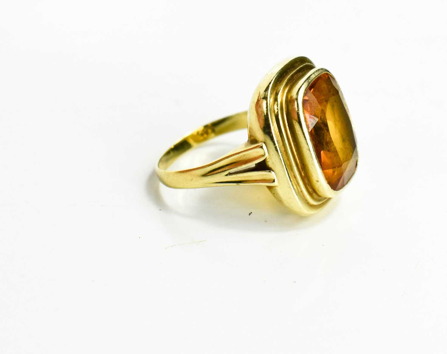 A 15ct gold and citrine ring,the rectangular cut citrine measures 8 by 5mm, size N, 5.5g. - Image 2 of 4