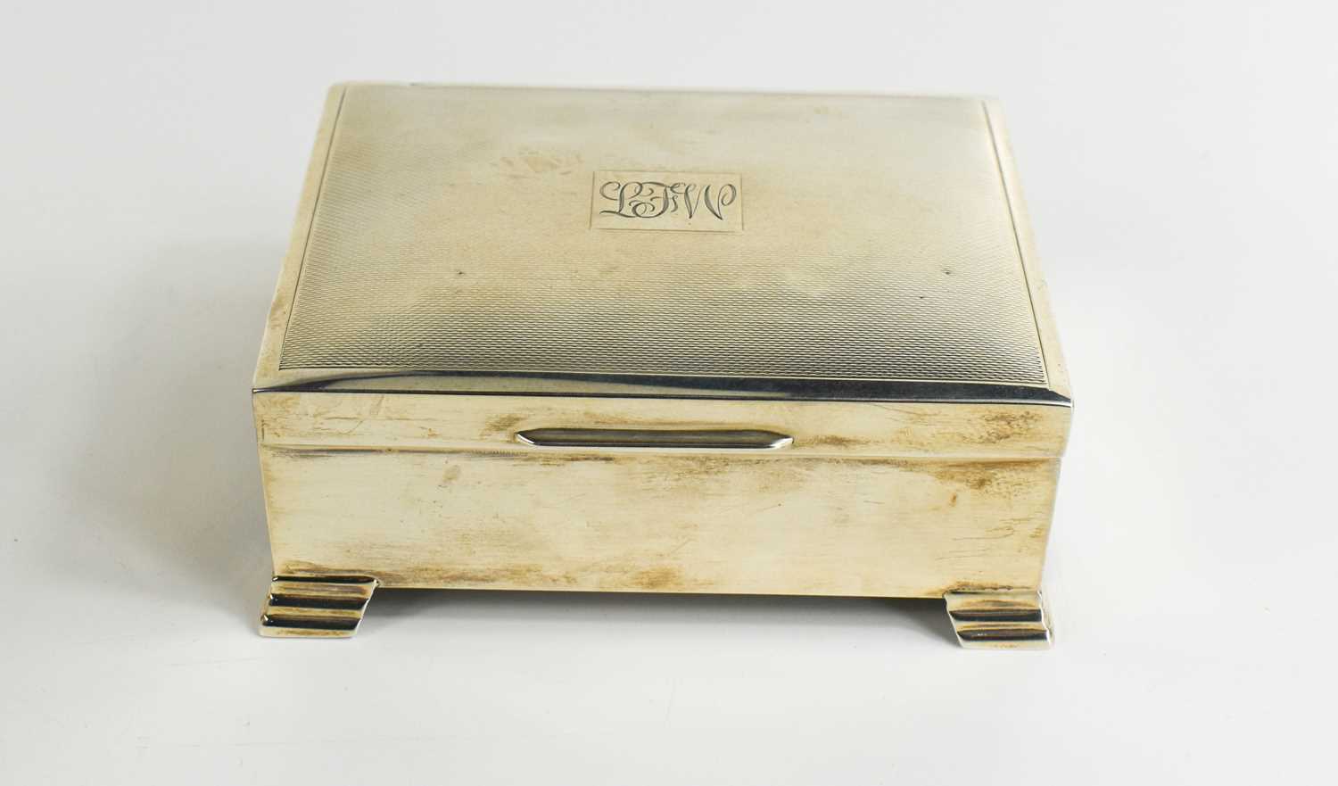 A silver cigarette box with engine turned decoration to the lid, monogram engraved, 11.4 by 8.7 by - Image 2 of 3