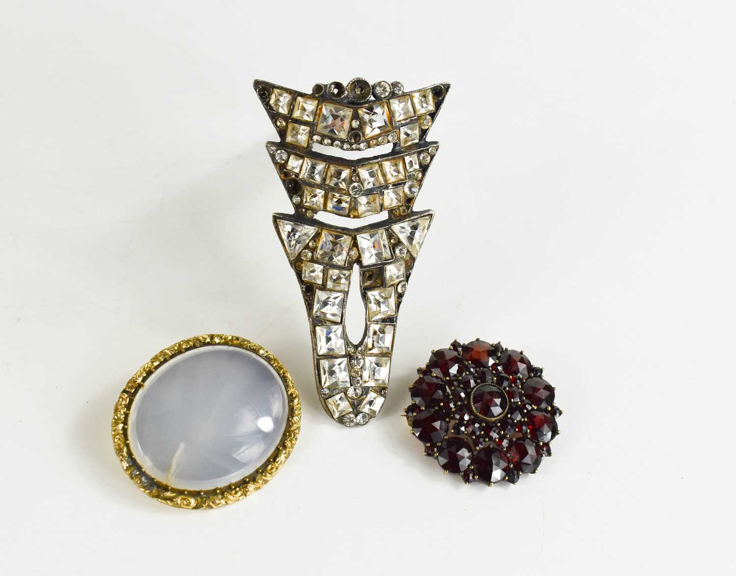 An Art Deco French dress clip set with paste stones, stamped Scemama, together with two Victorian - Image 4 of 4