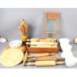 A group of vintage kitchenalia to include wooden rolling pins of differing sizes, jelly moulds to