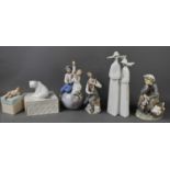 A selection of Lladro, to include polar bear, children on top of the world, two nuns, Don Quixote,