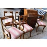 A set of six mahogany 19th century style dining chairs together with a yew wood reproduction bureau,